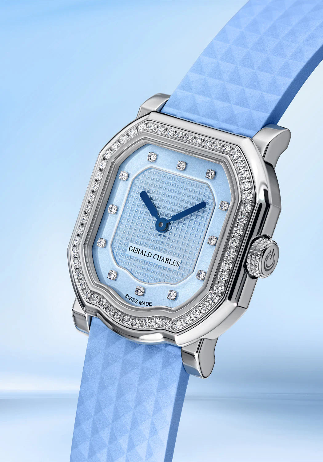 Gerald Charles watch with light blue face and strap on a matching background