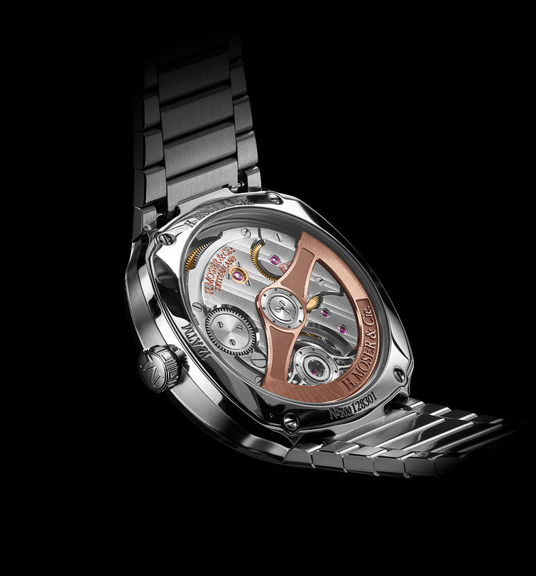 Silver-toned watch with exposed tourbillon mechanism, rose-gold accents, and metal link bracelet on black background.
