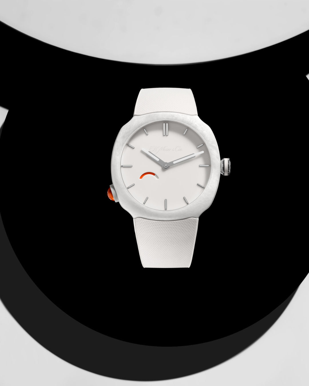 White watch with minimalist dial, silver hour markers, white silicone strap, and orange accent detail on side.
