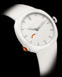 White watch with round dial, silver hour markers and hands, orange accent subdial, and white rubber strap.