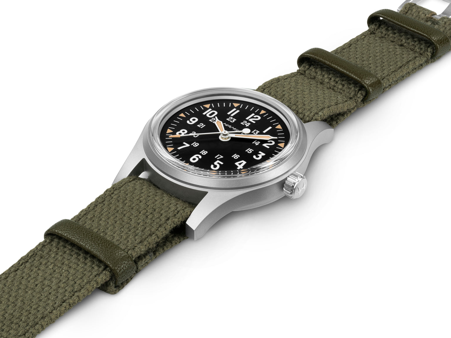 Watch with green strap and black dial on a white background