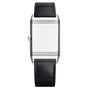 The Jaeger-LeCoultre Reverso Classic Monoface Small Seconds is a rectangular silver wristwatch with a minimalist Art Deco design, white dial, black calfskin strap, ridged left crown, and features the mechanical Calibre 822 movement.
