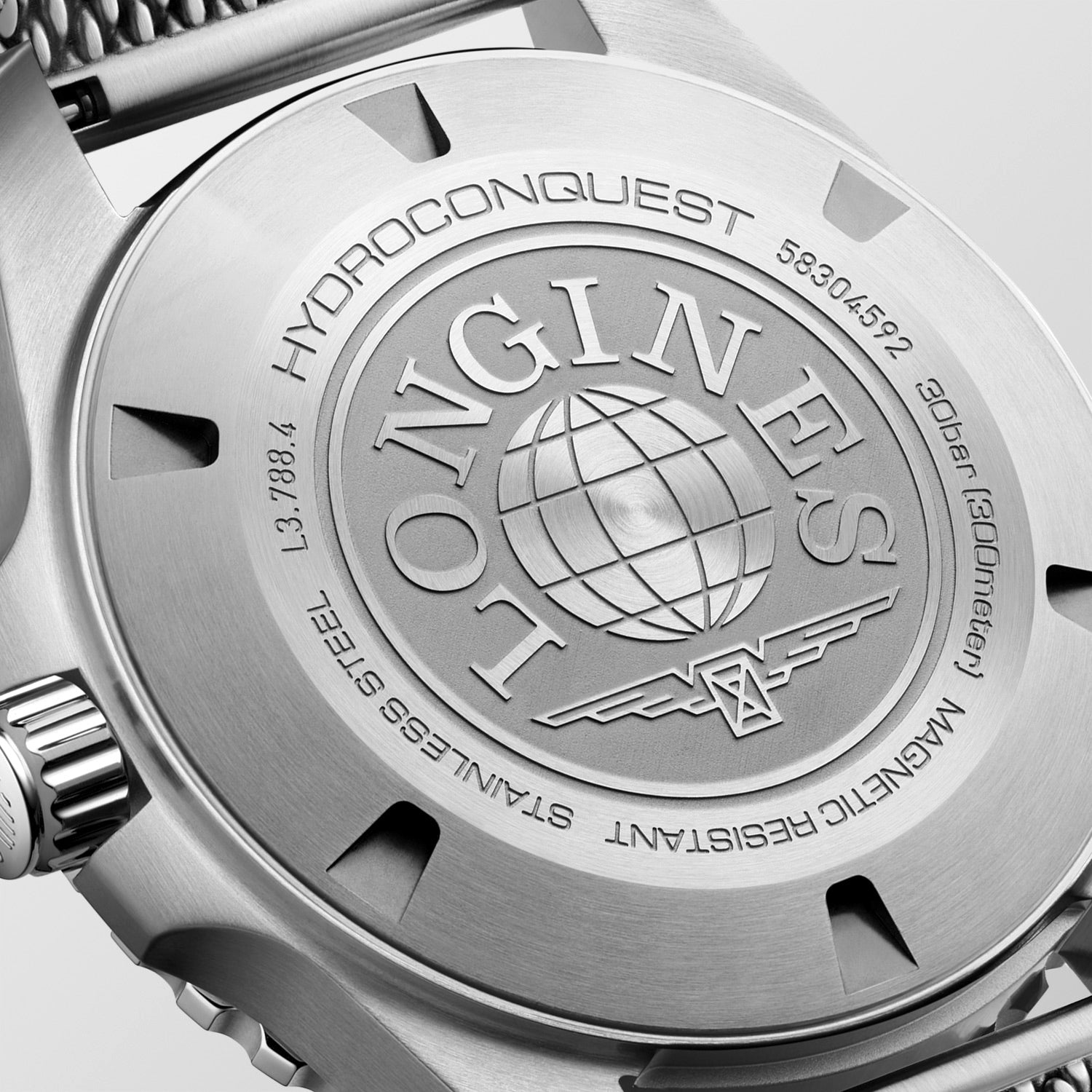 Close-up of a watch case with 'Longines' branding and 'HydroConquest' text.