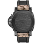 The back of the Panerai Submersible QuarantaQuattro GMT Navy SEALs Carbotech™ shows an engraved U.S. Navy SEALs emblem, camo-patterned fabric strap with visible stitching, and engravings noting its water resistance, GMT calibre, and collaboration.