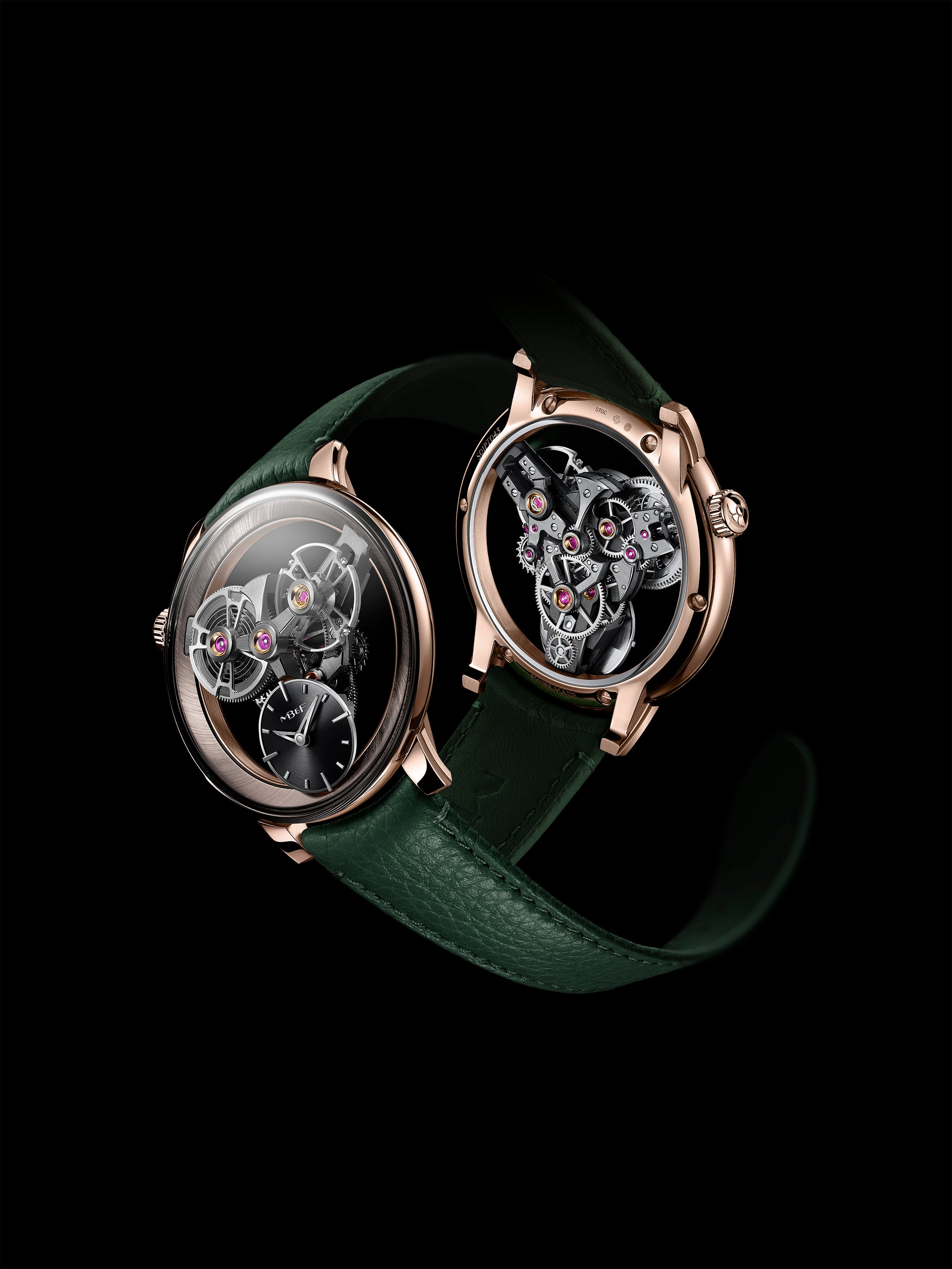 Two MB&F SP One Rose Gold luxury wristwatches with green leather straps and exposed mechanical movements are displayed on a black background.