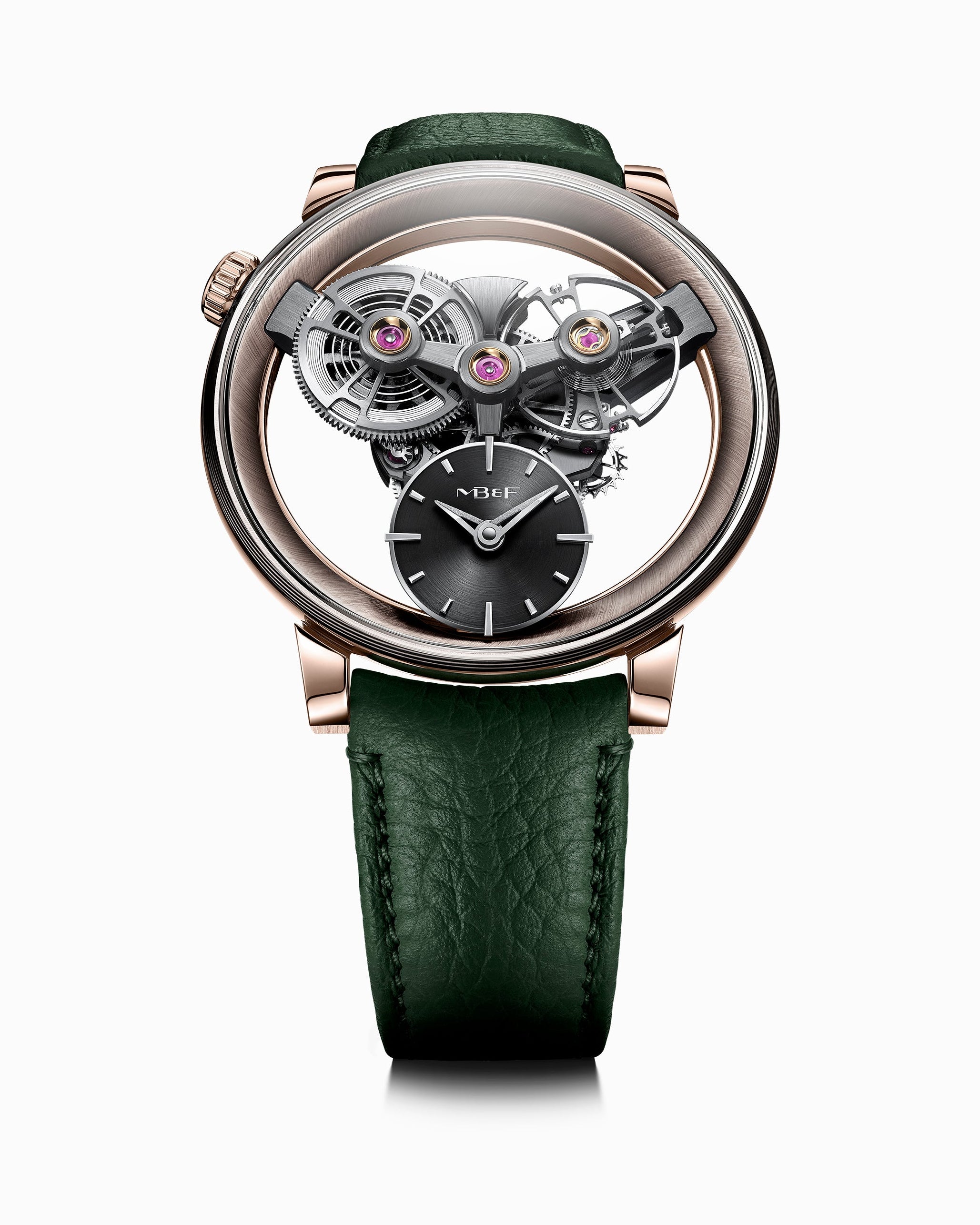 The MB&F SP One Rose Gold is a luxury watch featuring exposed gears, a black dial, and a green leather strap, showcased on a white background.