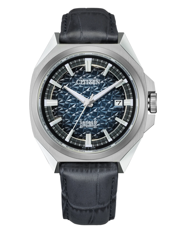 Citizen Series8 automatic watch with stainless steel case, blue textured dial, white hour markers, and black leather strap.