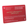 A red card displays the Master Chronometer Certificate from METAS, confirming your OMEGA Speedmaster Moonwatch Professional meets rigorous standards, with website details shown at the bottom.