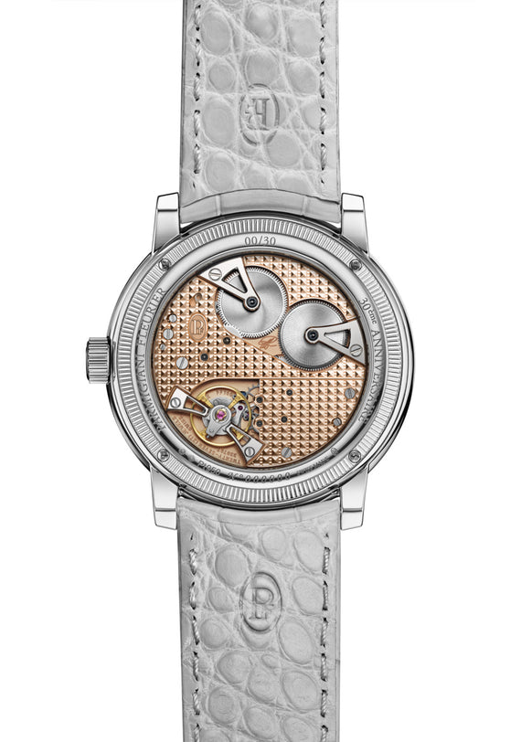 Watch with a detailed face and light gray strap on a white background