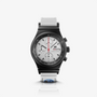 The Porsche Design Chronograph 1 F.A.T 2025 Edition is a black and white wristwatch with three subdials, a white strap, and Porsche and F.A.T. branding.