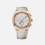 The Parmigiani Fleurier TONDA PF Sport is a gold watch with a textured white dial, fabric strap, three subdials, and gold hour markers.