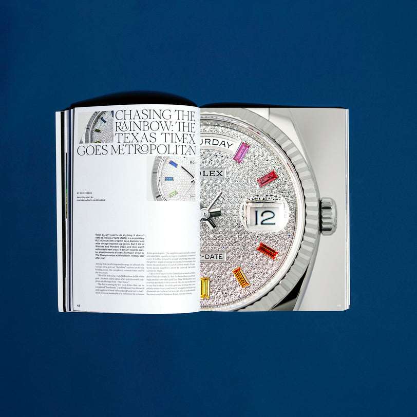 An open HODINKEE Magazine, Volume 12 by Hodinkee displays an article about a jeweled Rolex watch, featuring a close-up of the watch face with colorful gemstone hour markers, evoking classic watch advertisements.