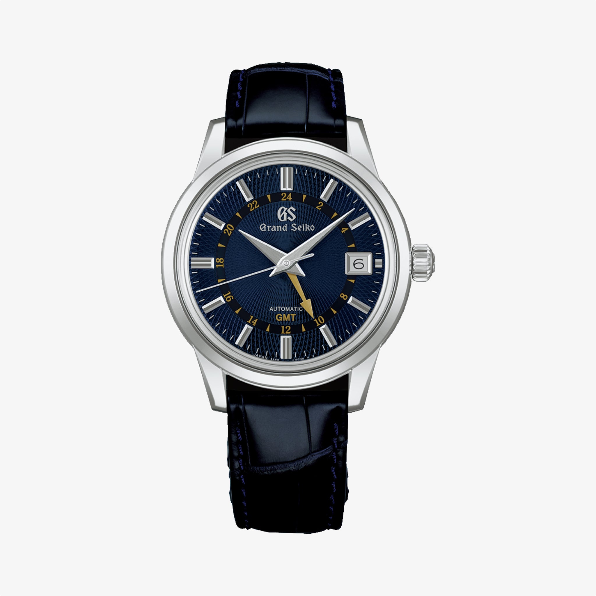 A Grand Seiko Automatic Mechanical GMT wristwatch features a deep blue dial with gold accents, silver hour markers, Zaratsu-polished case, date at 3 o’clock, blue leather strap, and is powered by the Caliber 9S66 GMT movement.