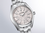 Grand Seiko stainless steel watch with silver textured dial, applied hour markers, and three-link bracelet.