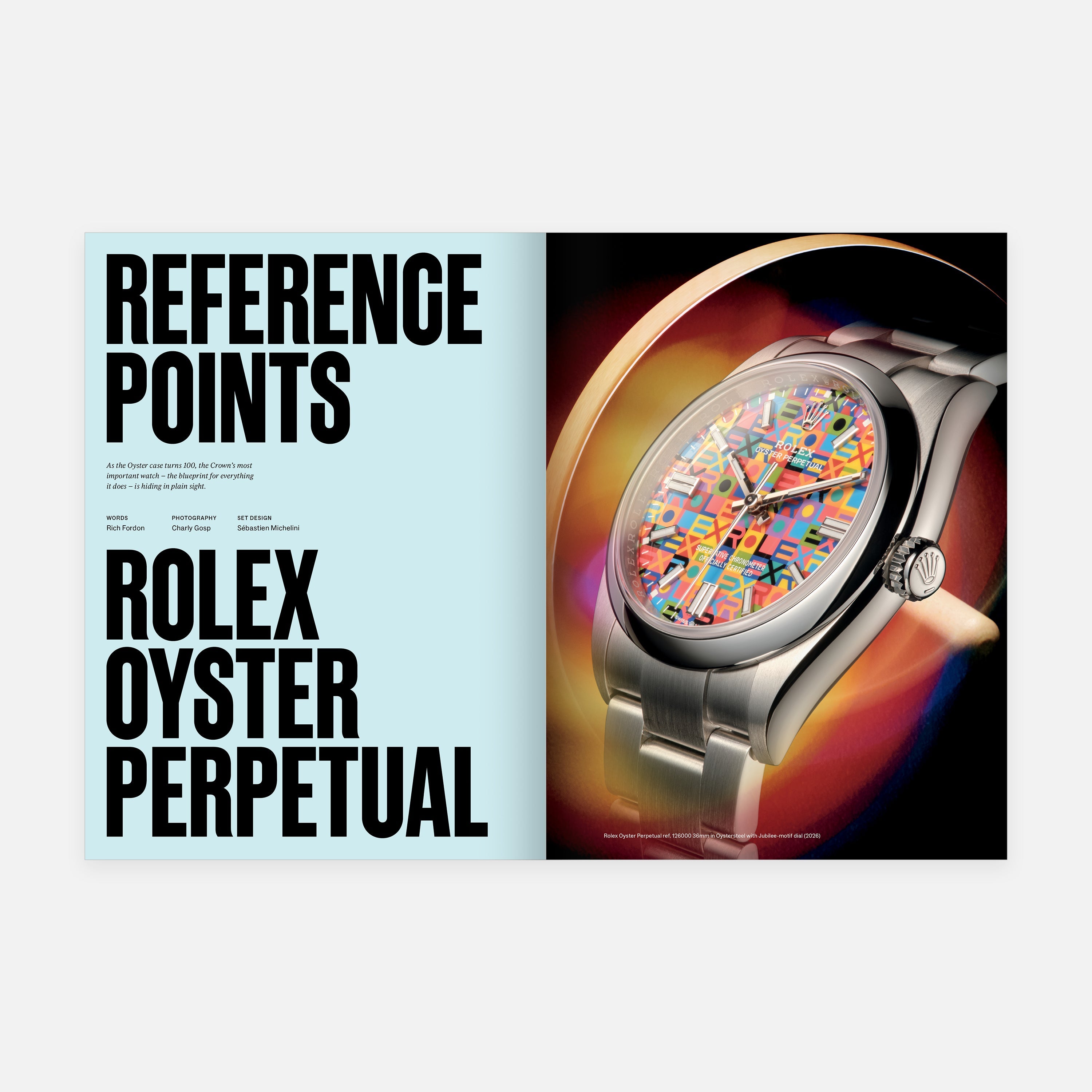 Rolex Oyster Perpetual watch with colorful face on a magazine cover