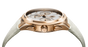 Side view of the Parmigiani Fleurier TONDA PF Sport gold luxury wristwatch, featuring a white textured strap and a white dial with multiple subdials.