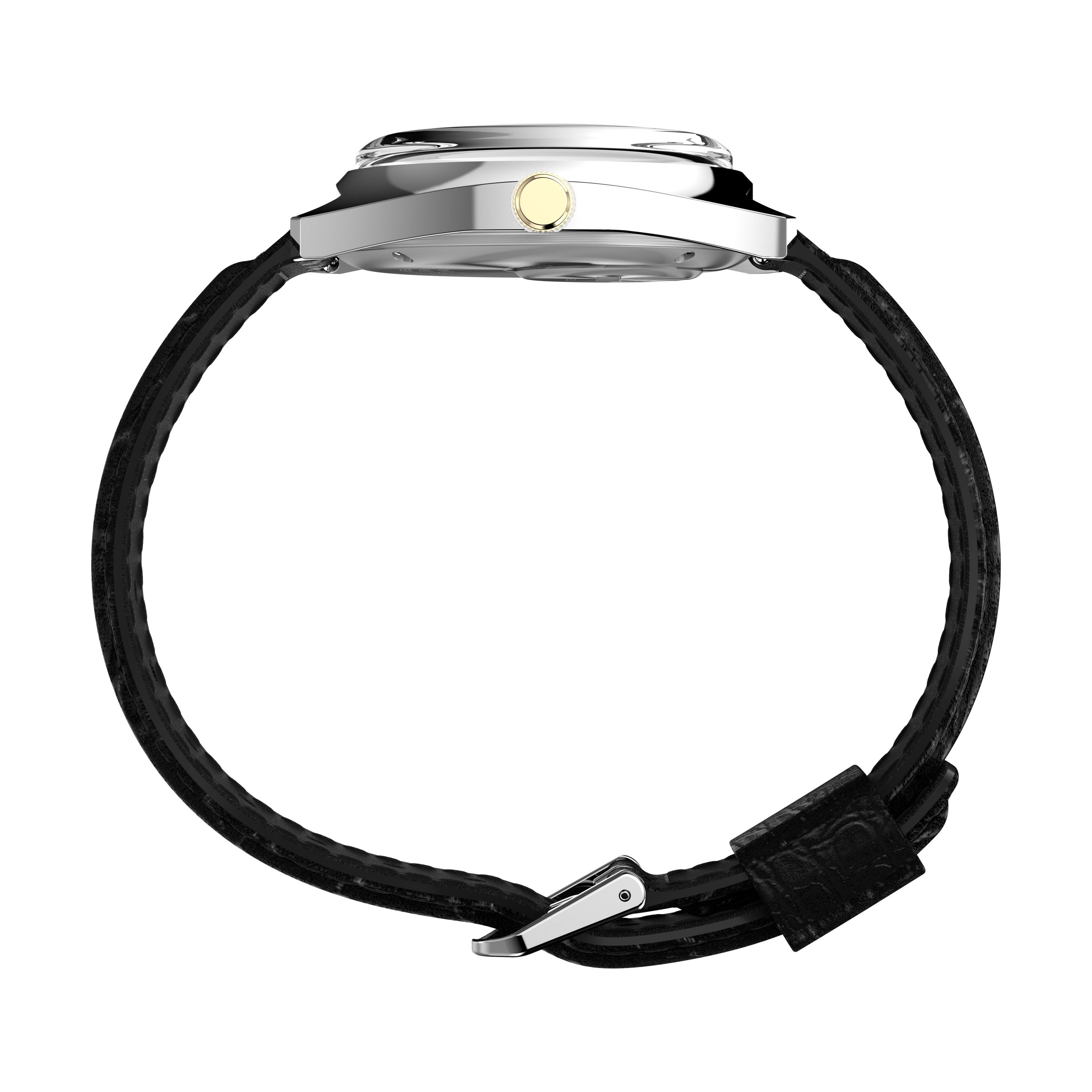 Side view of the Timex Q 1978 Day/Date watch with black leather strap, silver case, and gold crown on a white background. The strap’s buckle and stitching are shown, emphasizing its classic quartz movement.