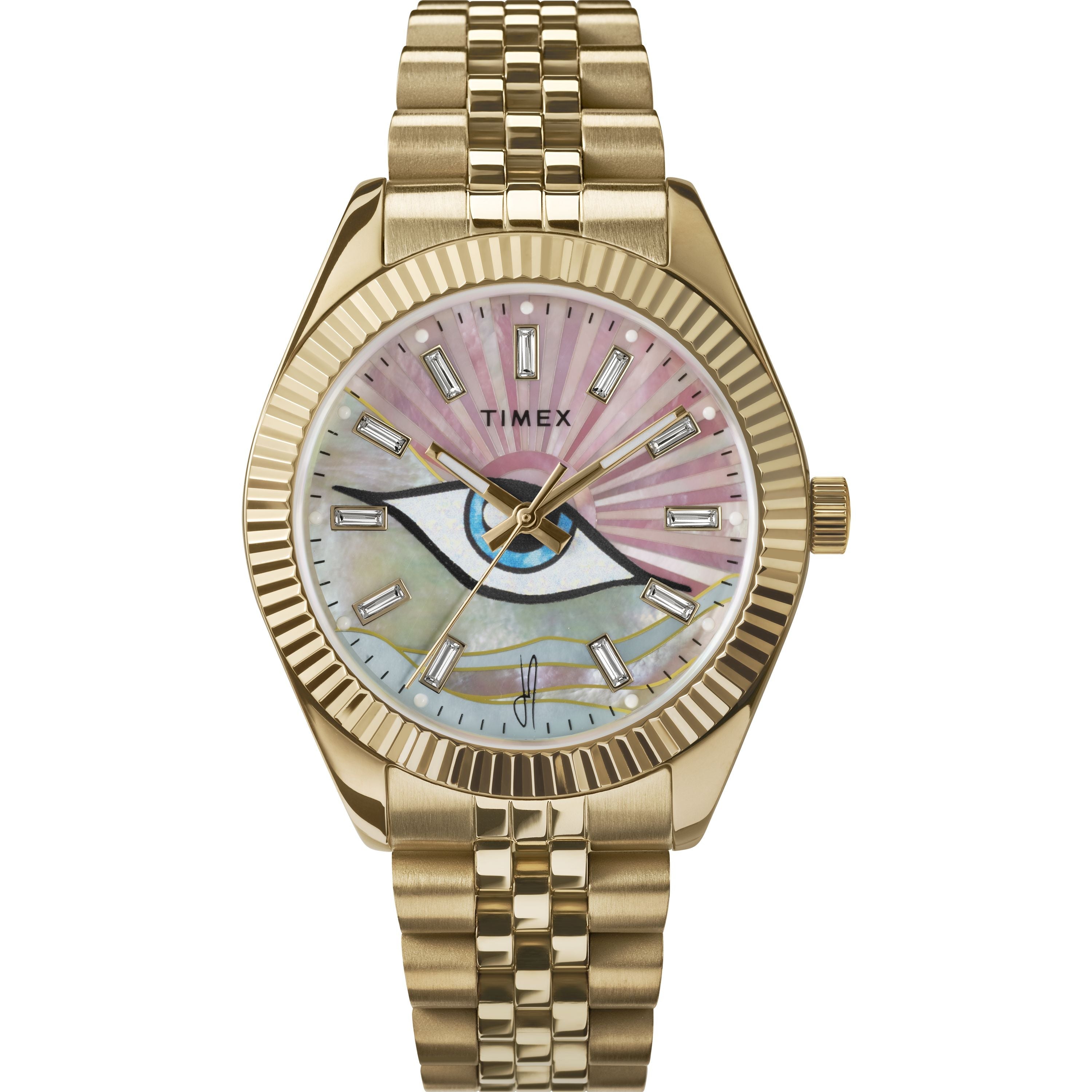 The Timex x Jacquie Aiche watch by Timex features a gold-tone metal link band, a pink iridescent mother-of-pearl dial with an eye motif at the center, and rectangular hour markers.