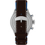 Back view of the Timex x Pan Am® Waterbury Ace Chronograph featuring a dark brown leather strap with white stitching, blue accents, and a silver engraved TIMEX buckle. The stainless steel case and two push buttons are also partially visible.
