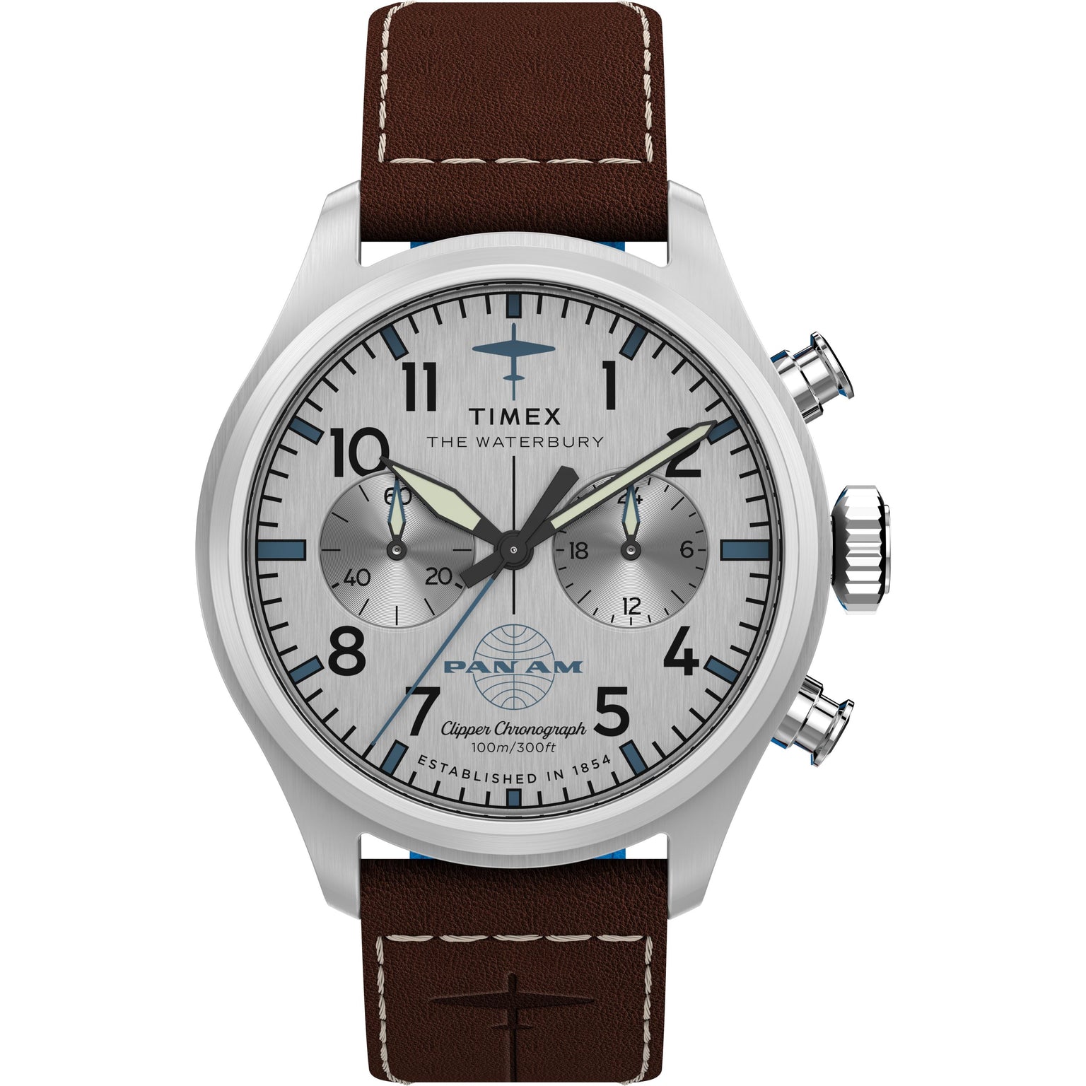The Timex x Pan Am® Waterbury Ace Chronograph features a silver dial with black markers, brown leather strap, Pan Am logo above 6 o’clock, stainless steel case, three subdials, and two pushers on the right.