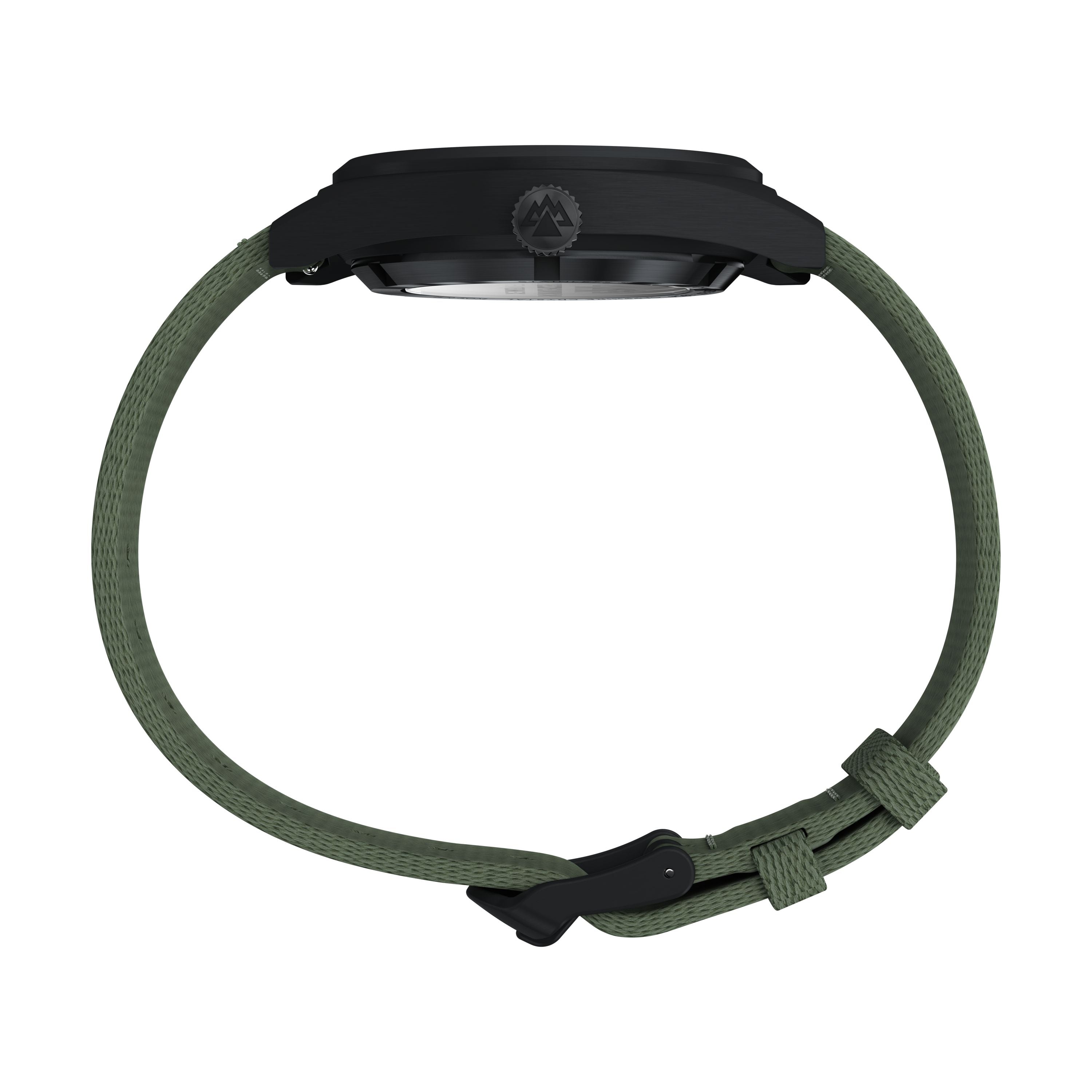 Side view of the Timex Expedition® Capstone Automatic, a 39mm stainless steel watch with black case and green fabric strap, shown fastened horizontally. The crown bears a mountain logo.