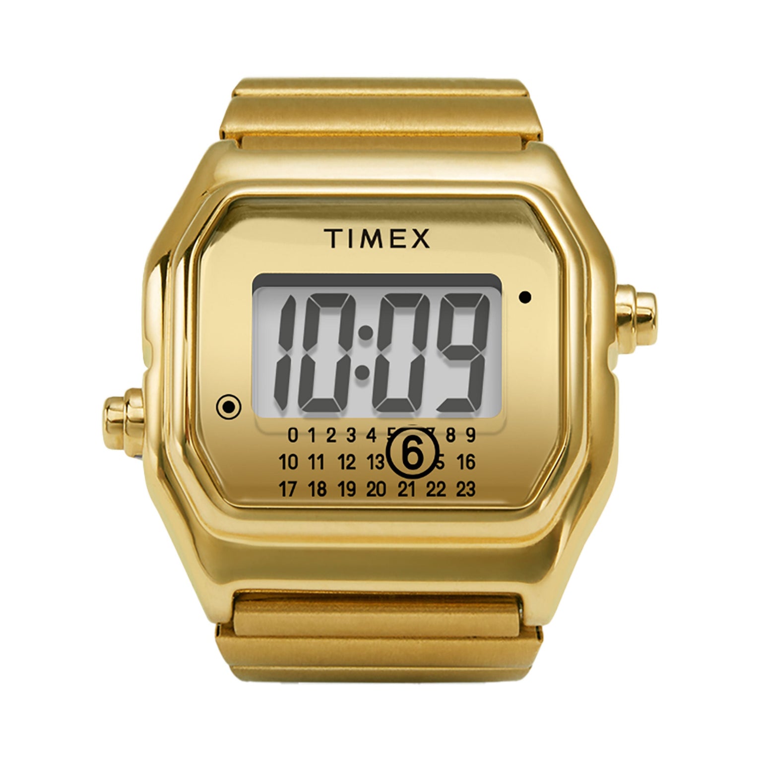 The Timex MM6 Gold Tone Digital Ring Watch shows 10:09 on its rectangular face, features a numeric calendar below the display, and has a metallic gold band.