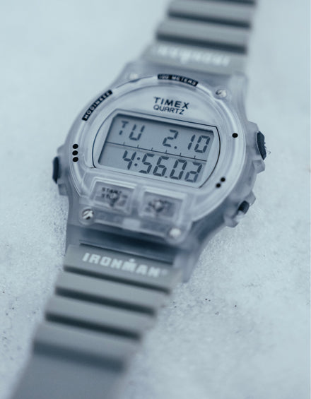 Digital watch with 'Timex' branding on a light gray background