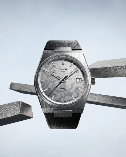 Tissot Damascus steel and lack leather watch