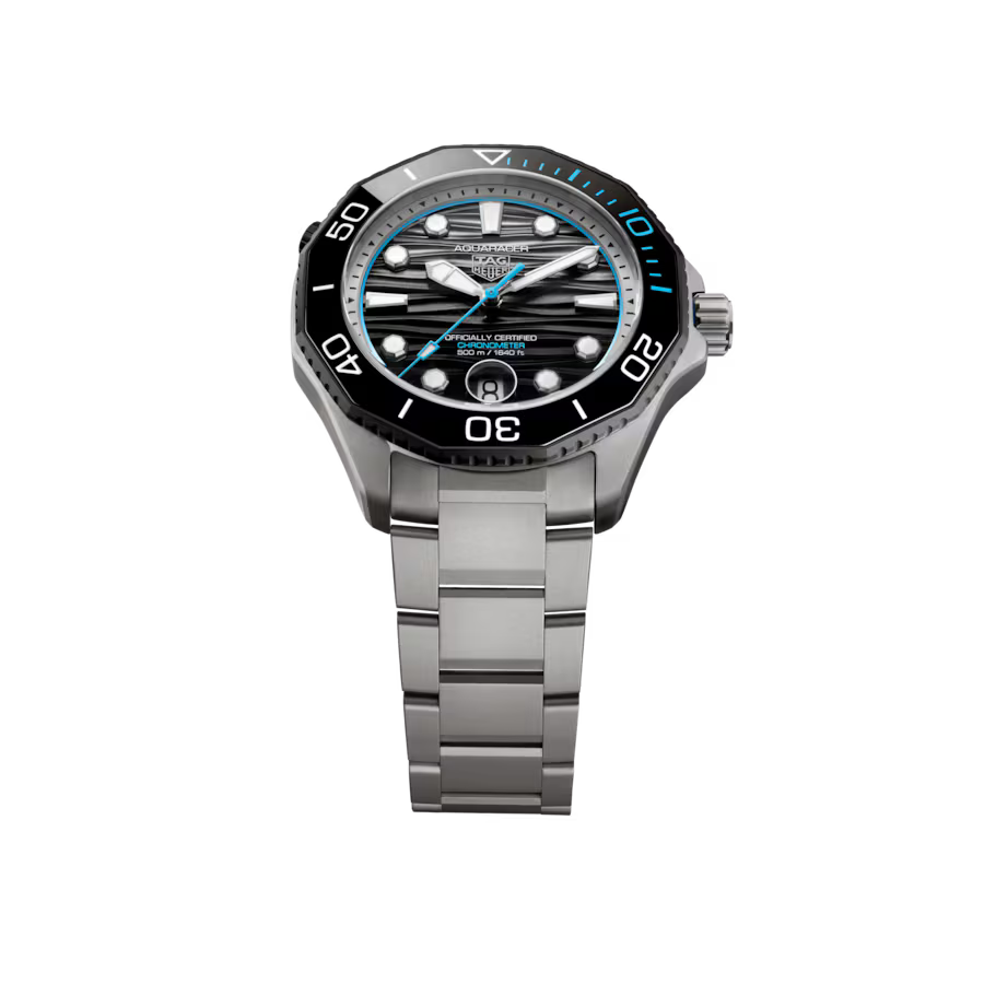 Silver stainless steel dive watch with black bezel, striped black dial, blue accents, and matching metal bracelet.