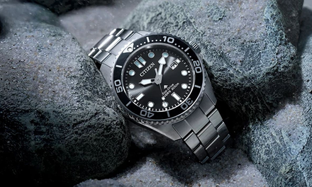 Citizen watch on a rocky surface