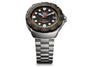 TAG Heuer Formula 1 watch with black dial, white hour markers, red seconds hand, date window, and stainless steel bracelet.