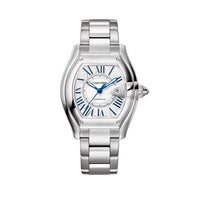 Silver Cartier watch on a light beige background