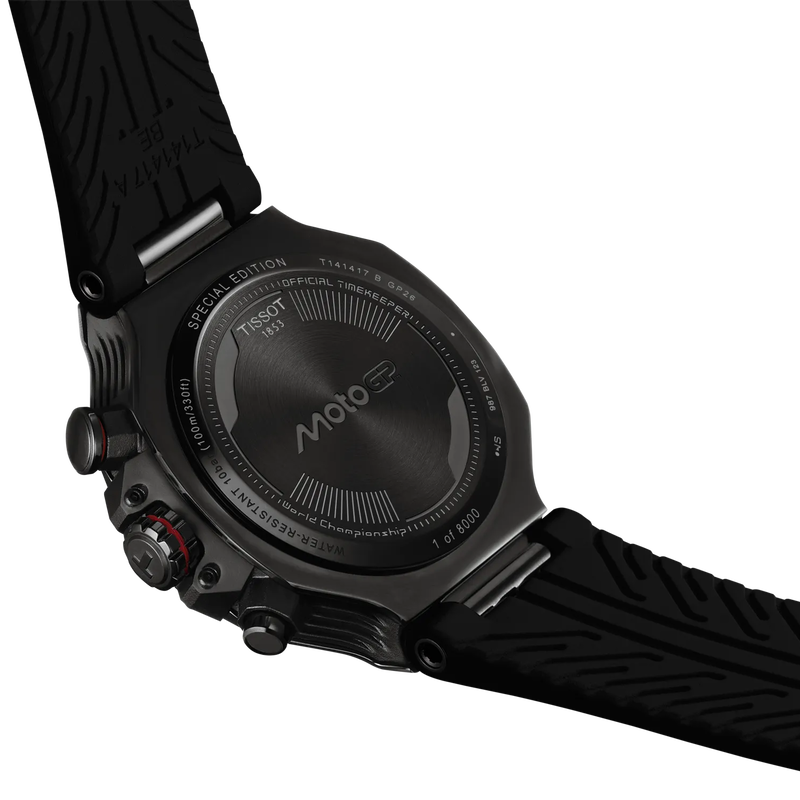 Black Tissot watch with detailed case and strap on a white background