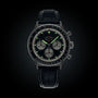 Black Breitling watch with detailed face on a black background