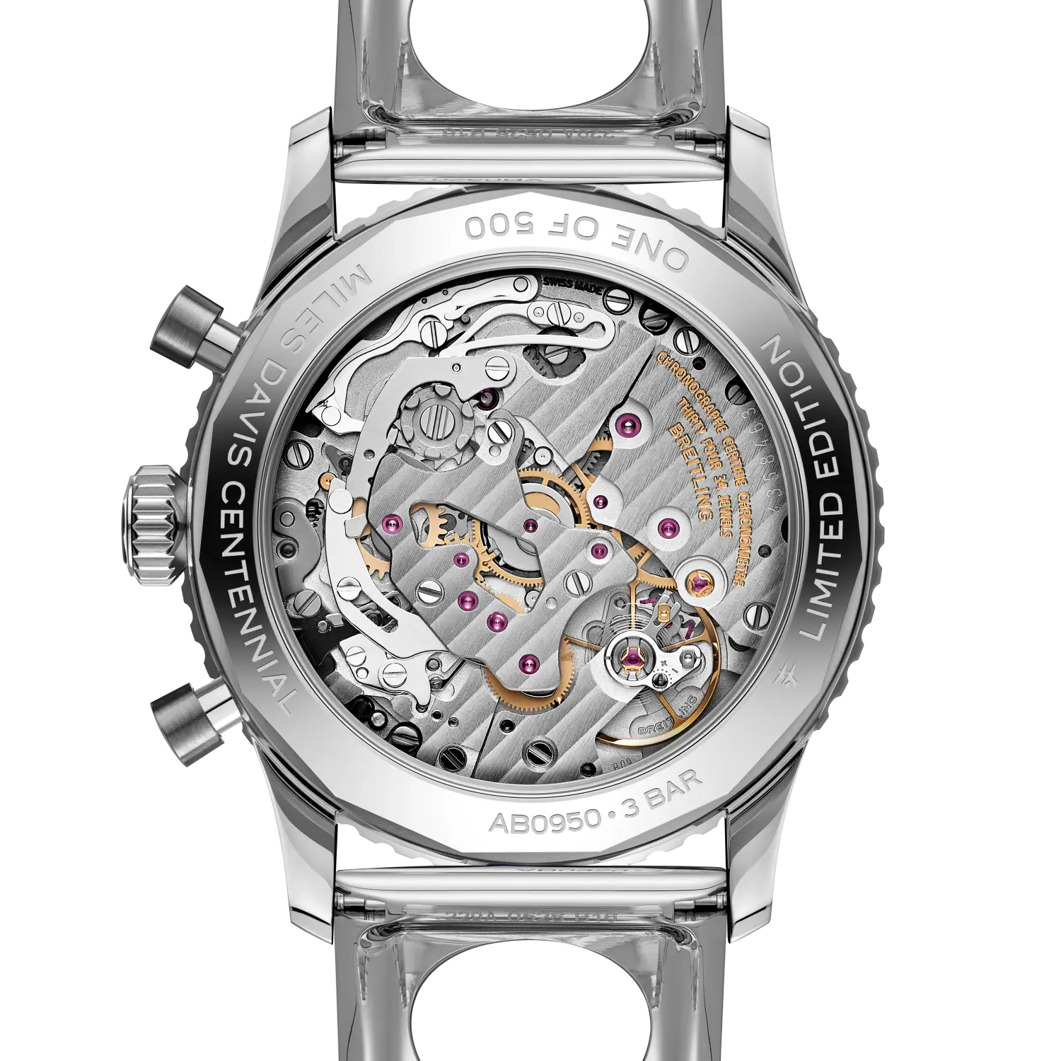 Stainless steel chronograph watch caseback with visible mechanical movement, purple jewels, and gold accents.