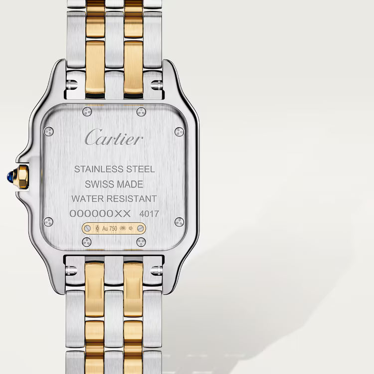 Cartier watch with two-tone band on a white background