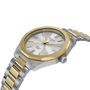 Two-tone silver and gold watch with Tissot logo on a white background