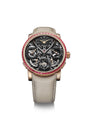 Luxury watch with a detailed face and red accents on a white background