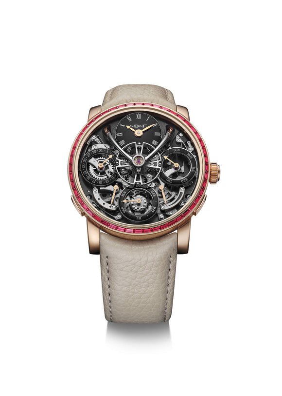 Luxury watch with a detailed face and red accents on a white background