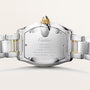 Cartier Roadster watch rear view showing stainless steel case back, two-tone bracelet with gold accents, and water resistance