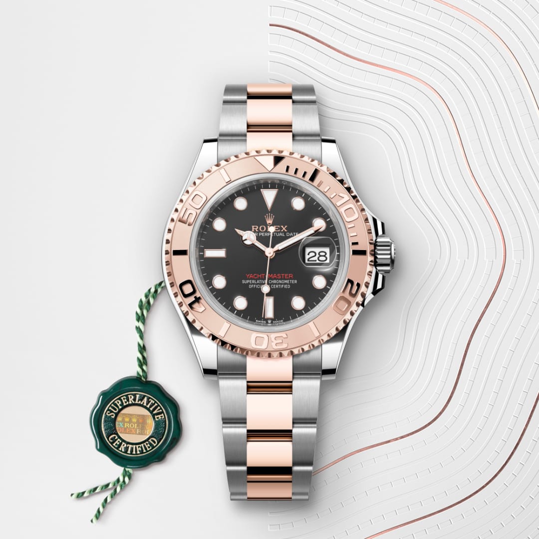 A Rolex Yacht-Master watch with a two-tone silver and rose gold band, shown with a Superlative Certified tag.