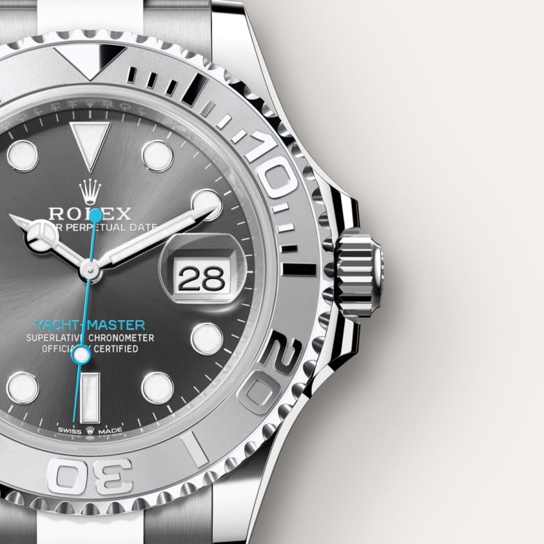 Close-up of a silver Rolex Yacht-Master watch showing the time, date, and detailed bezel and dial.