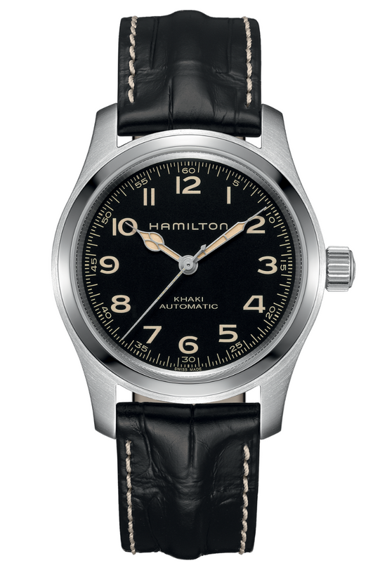 The Hamilton Khaki Field Murph Auto features a black dial with beige numerals and a black leather strap with white stitching.