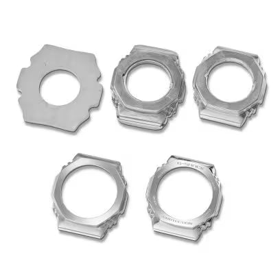 Five clear plastic watch bezels and cases with octagonal shapes for digital watch assembly.