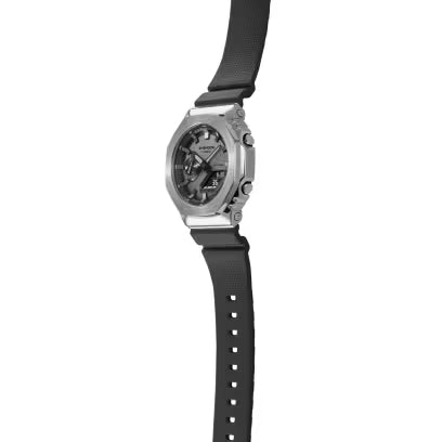 Square stainless steel digital watch with black resin band and dark dial.