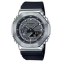 G-Shock digital-analog watch with silver metal case, black dial, and black resin band.