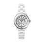 The Chanel J12 wristwatch features a white ceramic case, round face, black numerals, and silver bezel, renowned for high precision, shown against a plain white background.