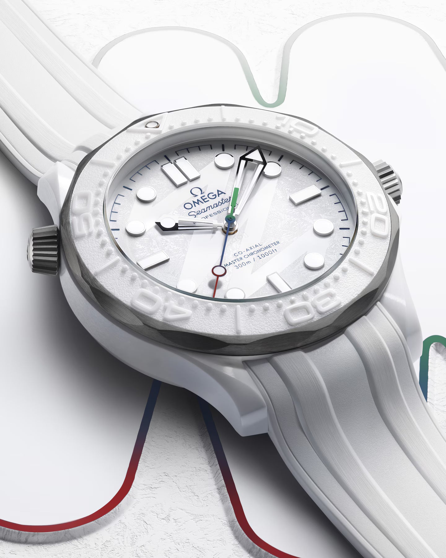 White Omega watch with detailed face and strap on a light background
