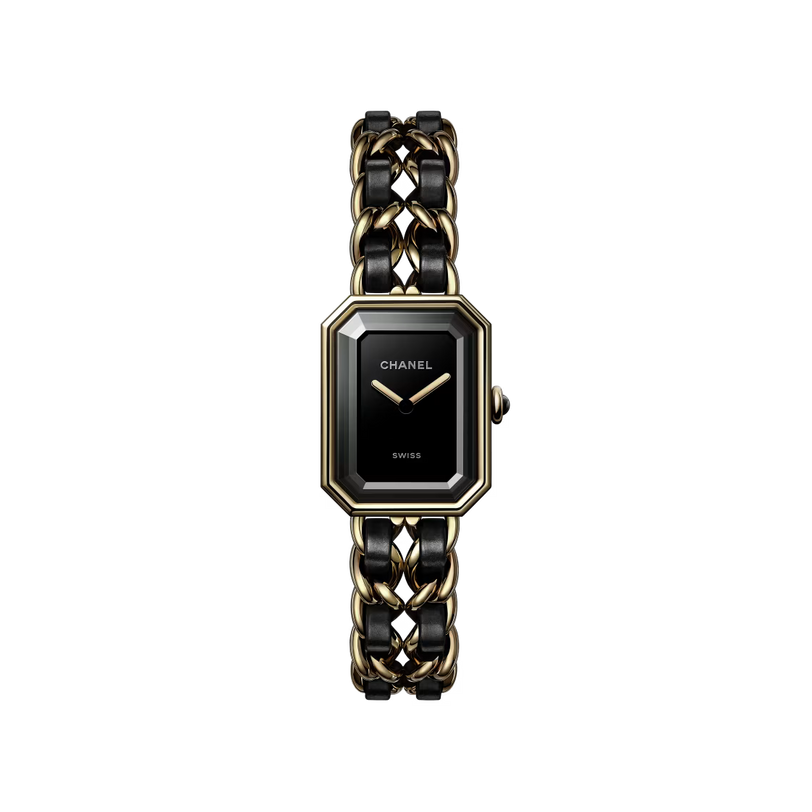The Première Édition Originale Small Model by Chanel is a luxury wristwatch with a rectangular black-lacquered dial, yellow gold steel case, chain-link bracelet woven with black leather, gold hands, and "CHANEL" on the dial.