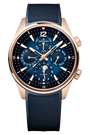 The Jaeger-LeCoultre Polaris Perpetual Calendar is a luxury pink gold watch with a blue dial, perpetual calendar, moon phase sub-dials, textured blue strap, white markers, and gold-accented hands for an elegant look.